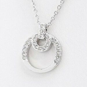 Rarely worn Swarovski necklace with circle pendant